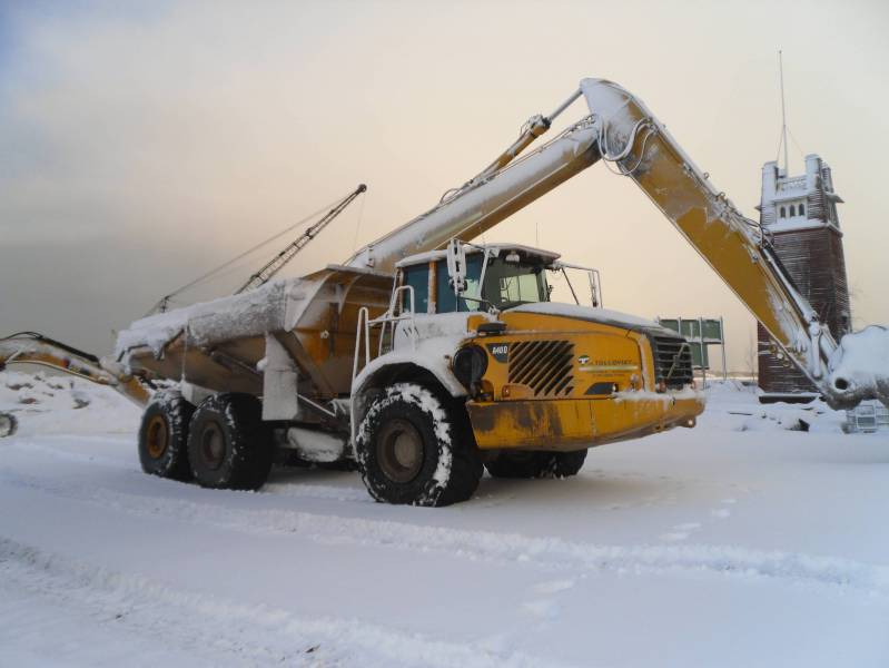 Talvinen foto Mäntyluodon ajokistani.
Lunta tuli ja taivas salamoi tuona päivänä. 
Avainsanat: volvo a40d