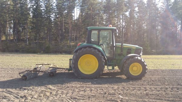 John Deere 6230 ja jyrä
